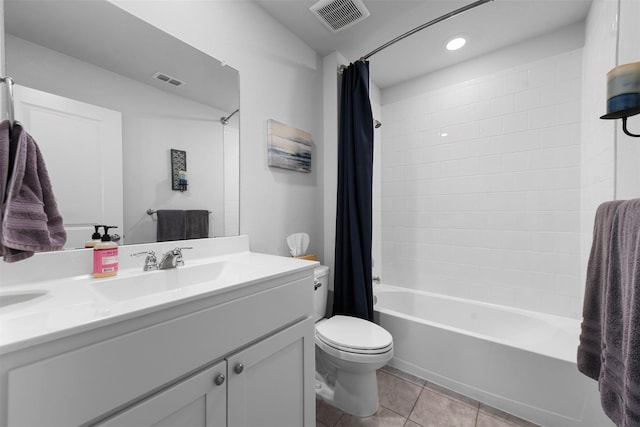 bathroom with shower / bath combo, visible vents, toilet, tile patterned floors, and vanity