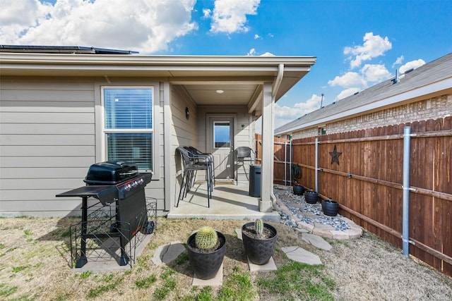 exterior space with a patio area and fence