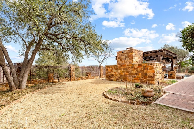 view of yard with fence