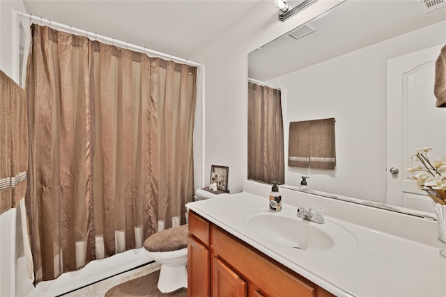 bathroom featuring toilet, visible vents, shower / bath combo with shower curtain, and vanity