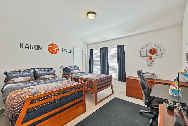 bedroom featuring carpet flooring, vaulted ceiling, and baseboards