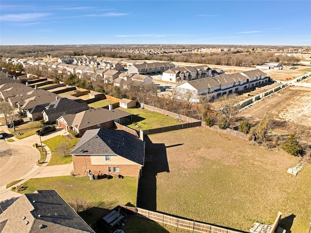 birds eye view of property with a residential view