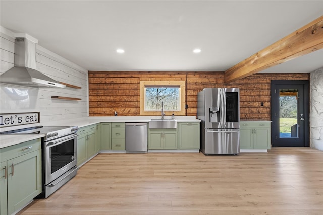 230 Frosty Hollow Rd, Denison, TX 75021 - kitchen featuring green cabinets, stainless steel appliances, wall chimney exhaust hood, a sink, and plenty of natural light