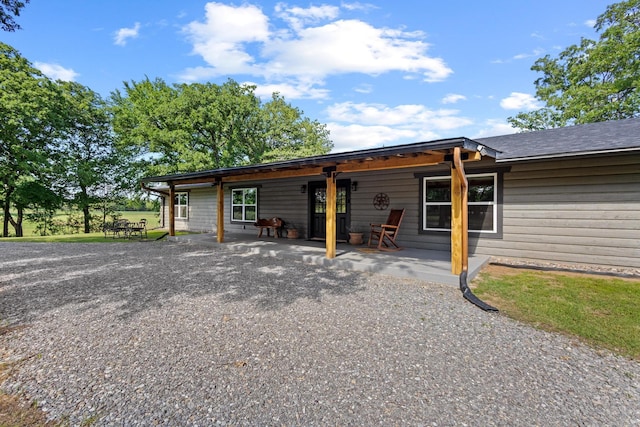 230 Frosty Hollow Rd, Denison, TX 75021 - rear view of house with a patio area