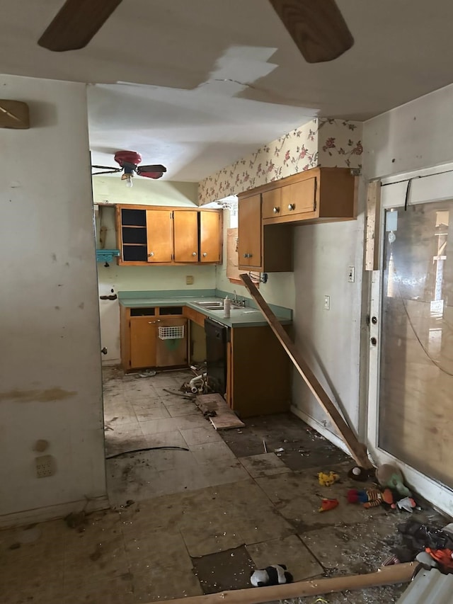 kitchen featuring brown cabinets, dishwasher, and ceiling fan