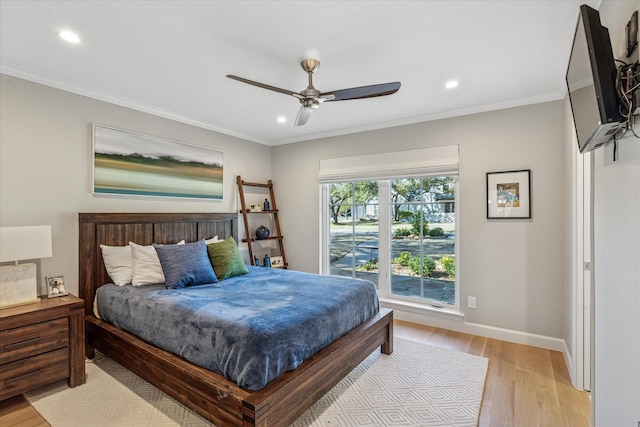 bedroom featuring crown molding, recessed lighting, light wood-style floors, a ceiling fan, and baseboards