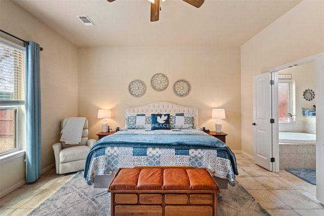 bedroom featuring light tile patterned floors, multiple windows, visible vents, and baseboards