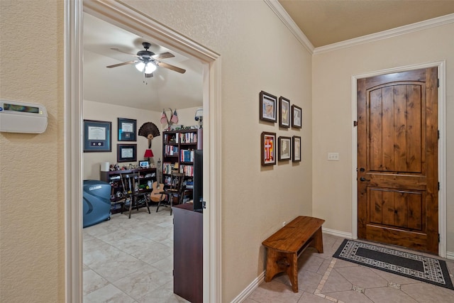 foyer with light tile patterned floors, baseboards, a ceiling fan, and crown molding