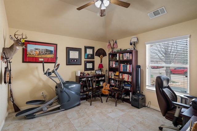 office with ceiling fan, visible vents, vaulted ceiling, and baseboards