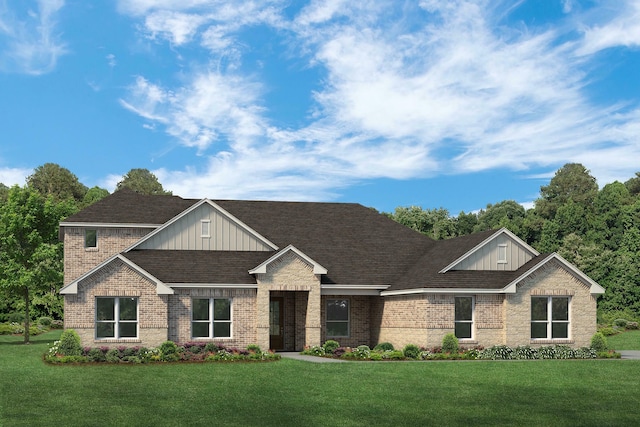 craftsman house featuring board and batten siding, brick siding, a front lawn, and roof with shingles