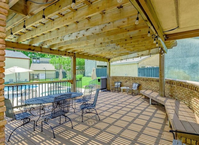 view of patio / terrace featuring fence