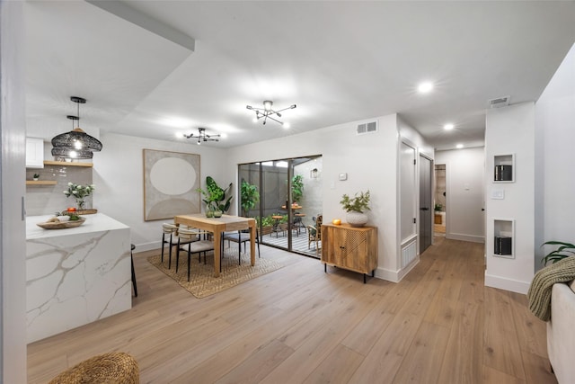 dining space featuring recessed lighting, baseboards, visible vents, and light wood finished floors