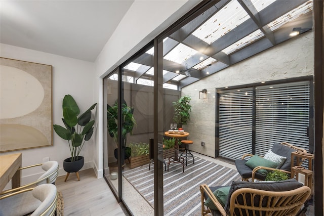 sunroom featuring a skylight