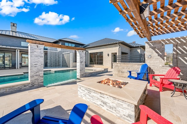 view of patio featuring an outdoor pool, a fire pit, and a pergola