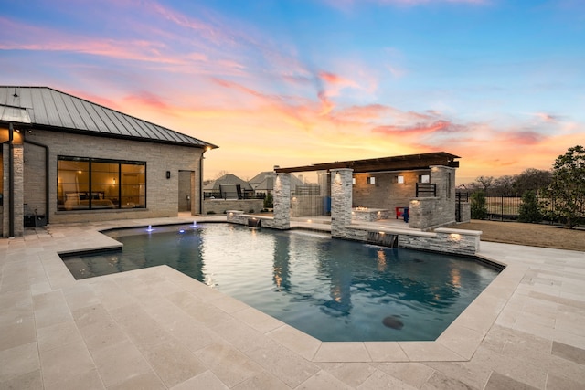 pool at dusk with a fenced in pool, a patio area, and fence