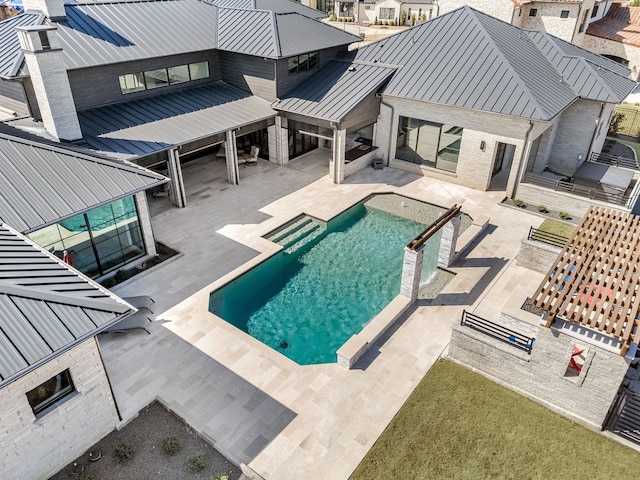 pool with a patio area