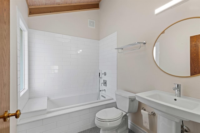 full bath featuring visible vents, lofted ceiling with beams, and toilet