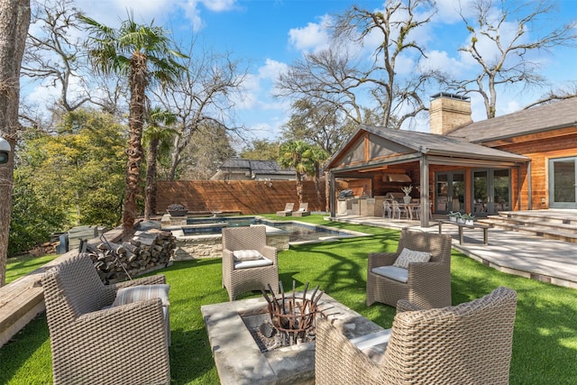 view of yard featuring an outdoor hangout area, a patio, a fenced backyard, and a fenced in pool