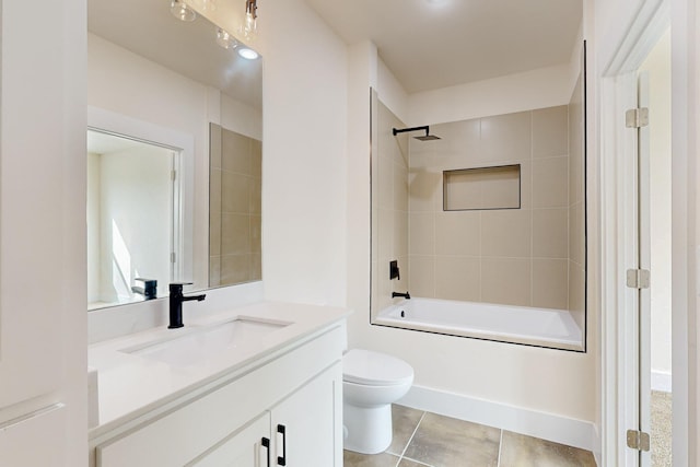 bathroom featuring toilet, vanity, shower / bathtub combination, and tile patterned floors