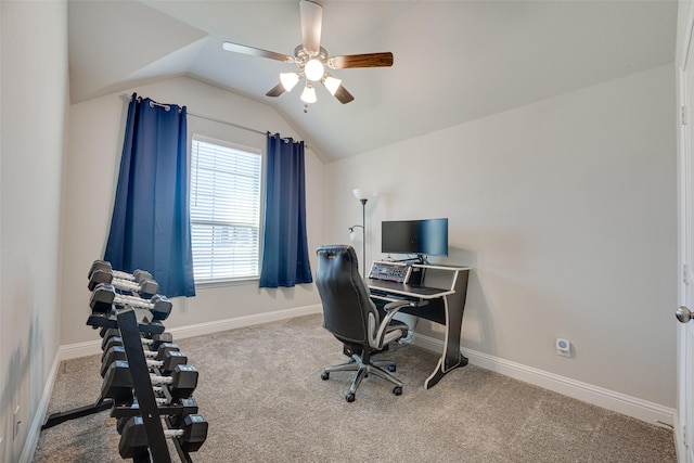 office featuring a ceiling fan, carpet, vaulted ceiling, and baseboards