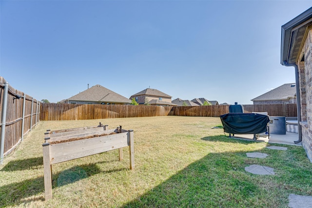 view of yard featuring a fenced backyard