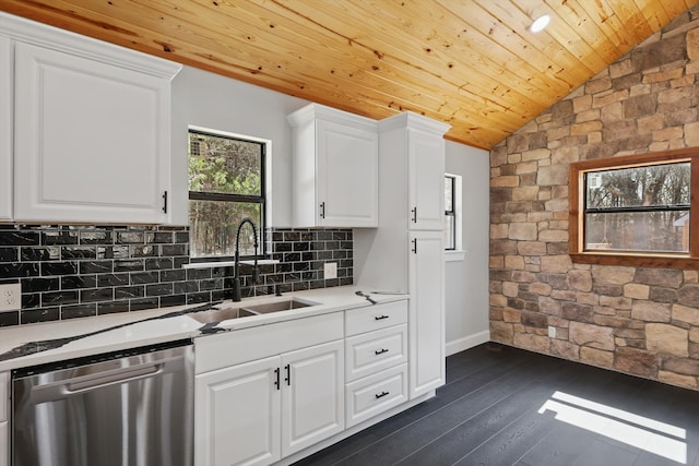 kitchen with a sink, tasteful backsplash, vaulted ceiling, wood ceiling, and dishwasher