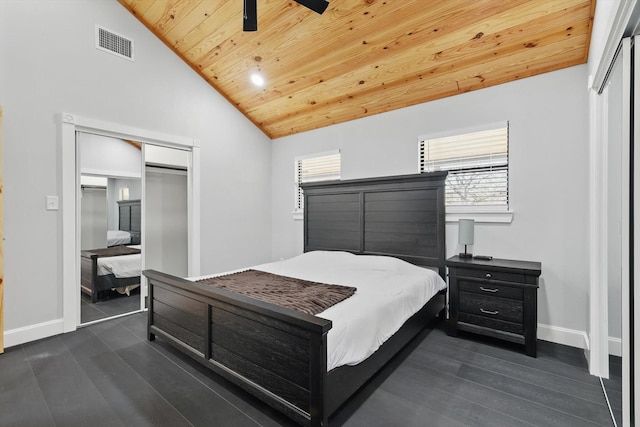 bedroom featuring wooden ceiling, lofted ceiling, visible vents, and a closet