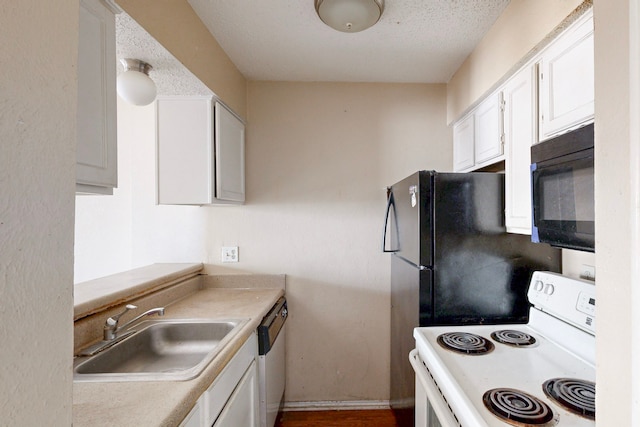 kitchen with black appliances, a sink, a textured ceiling, white cabinets, and light countertops