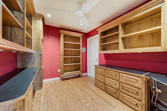 office space with light wood-type flooring, baseboards, and recessed lighting