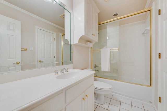 bathroom featuring bath / shower combo with glass door, toilet, ornamental molding, vanity, and tile patterned flooring