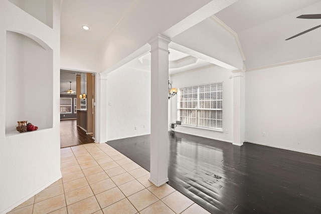 empty room featuring ceiling fan, recessed lighting, wood finished floors, decorative columns, and crown molding