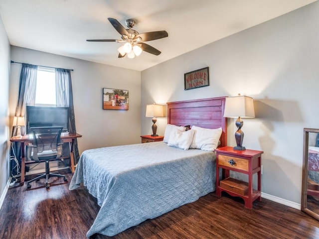 bedroom featuring ceiling fan, wood finished floors, and baseboards