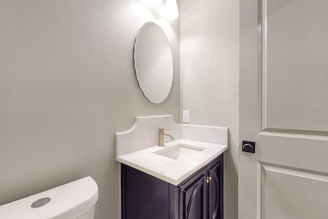 half bath with toilet and vanity