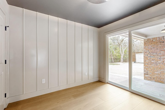 empty room with light wood-type flooring