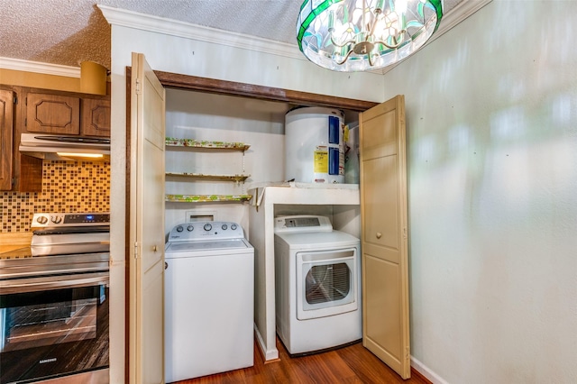 laundry room with dark wood-type flooring, laundry area, independent washer and dryer, and a textured ceiling