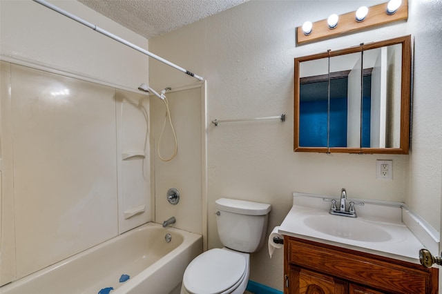 full bath featuring a textured ceiling, toilet, tub / shower combination, and vanity