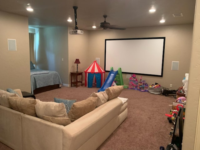 carpeted cinema featuring a ceiling fan, recessed lighting, and visible vents