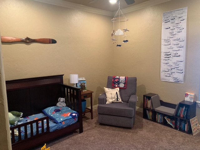 bedroom featuring a textured wall, ornamental molding, and carpet flooring