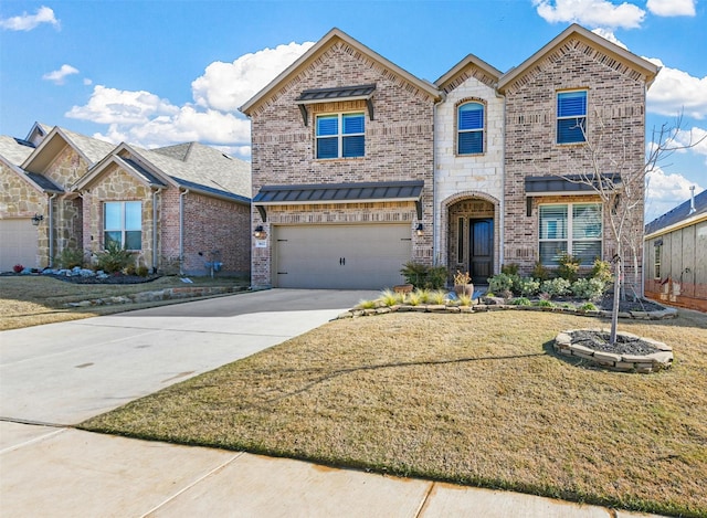 view of front of home featuring brick siding, an attached garage, stone siding, driveway, and a front lawn