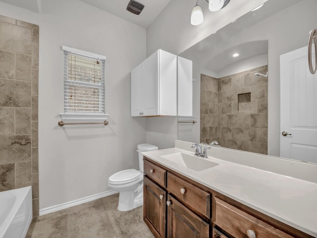 bathroom featuring toilet, tile patterned floors, baseboards, and vanity