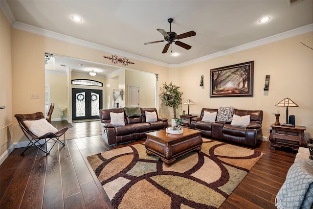 living room featuring crown molding, baseboards, dark wood-style flooring, and french doors