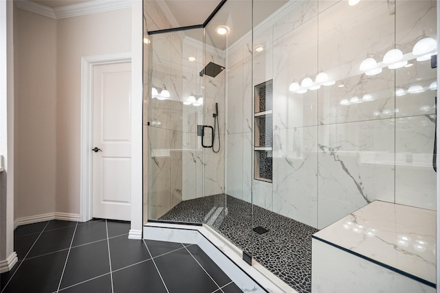 bathroom featuring ornamental molding, tile patterned flooring, and a marble finish shower