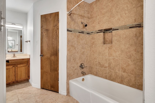 full bathroom featuring tile patterned flooring, vanity, and washtub / shower combination