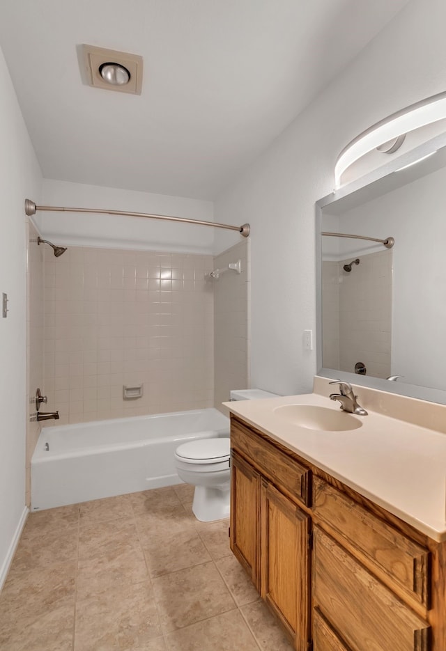 bathroom featuring shower / bath combination, vanity, toilet, and tile patterned floors