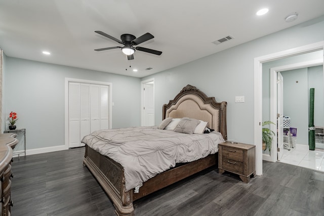 bedroom with dark wood-type flooring, recessed lighting, and baseboards