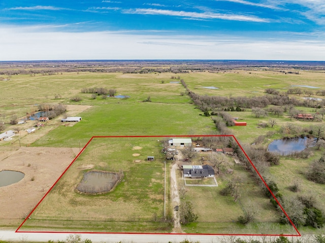 drone / aerial view featuring a rural view