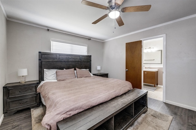 bedroom with dark wood finished floors and crown molding