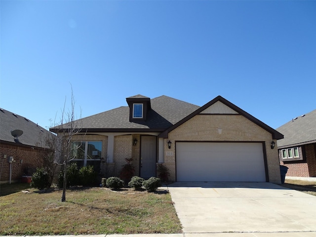 view of front of house with a garage, brick siding, driveway, and a shingled roof