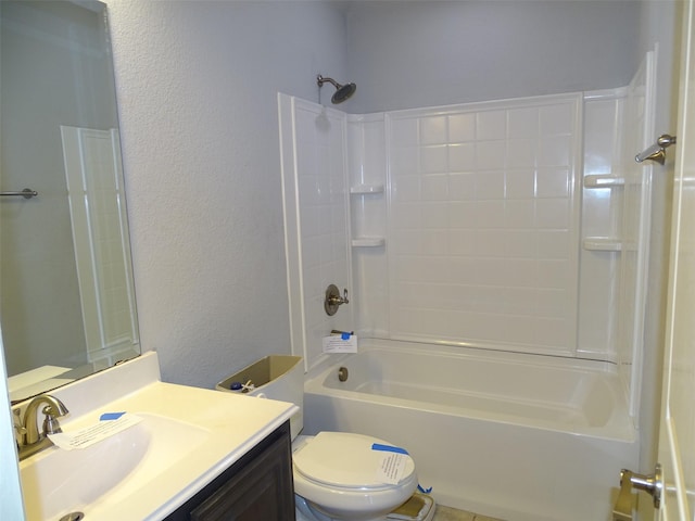 full bathroom featuring toilet, a textured wall, bathing tub / shower combination, and vanity