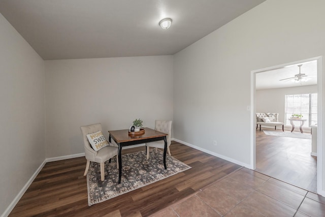 home office with baseboards, wood finished floors, and a ceiling fan